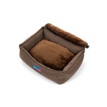 Cama nido ThermoSwitch MYKONOS para perro, en color marrón, con borde elevado, tecnología de reflexión térmica y manta de borreguito plegada.