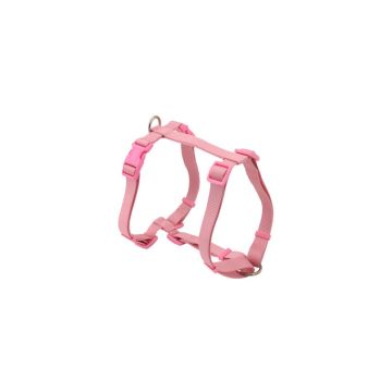 Vista lateral del arnés Nayeco Basic en H rosa de nylon con anillas metálicas y cierres plásticos